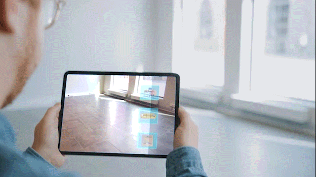 O GIF mostra o uso da RA (realidade aumentada) na construção civil.